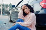 Car Accident Lawyer - Black woman portrait after bad car accident