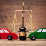 Hit & Run Accidents - Two Red And Green Car In Front Of Justice Scale