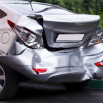 Benefits Of Hiring A Car Accident Lawyer - Big dent on car