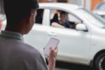 What To Do After An Uber Accident - customer ordering taxi via online apps